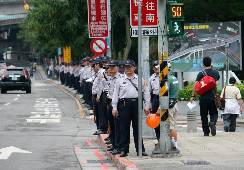 Police Line the Road