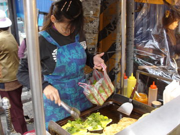 Street Vendor making CongYouBing