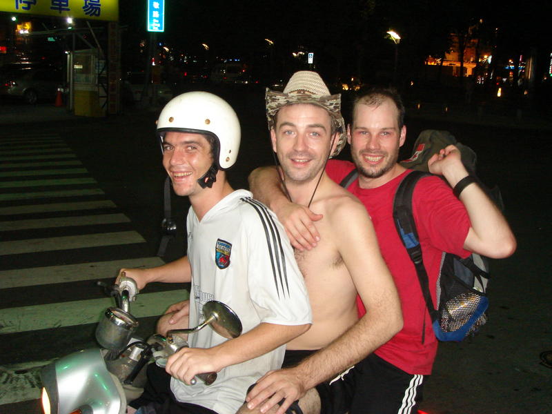 three men and a scooter