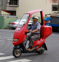 Red Scooter with Cover