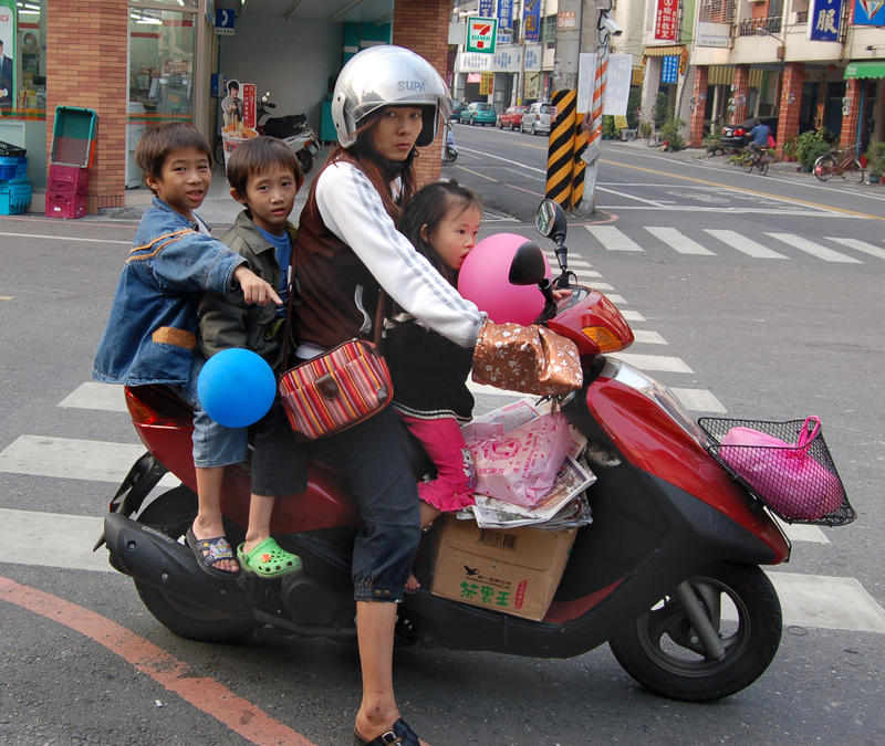 Mom and Three Kids on Scooter